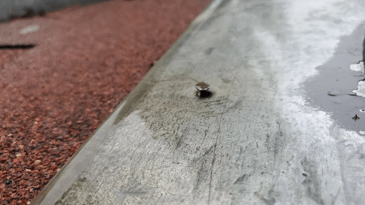 Nails on the roof that are lifted up
